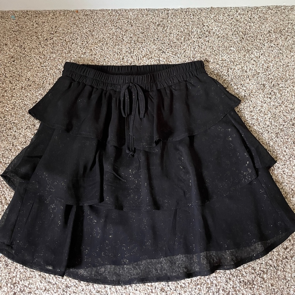 Black skirt with a light gold cheetah print pattern!